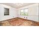 Corner bedroom with hardwood floors and windows offering a view to the outside at 270 Bromack Se Dr, Atlanta, GA 30315