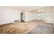 Bright living room with large window and doorway showing access to other rooms at 270 Bromack Se Dr, Atlanta, GA 30315