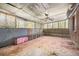 View of the living room that has multiple windows providing natural light and built in seating at 270 Bromack Se Dr, Atlanta, GA 30315