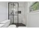 Modern bathroom with a sleek glass shower, updated fixtures, and stylish tile work at 3530 Boulder Cir, Ellenwood, GA 30294