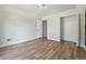 Bright bedroom with hardwood floors and a spacious closet at 3530 Boulder Cir, Ellenwood, GA 30294