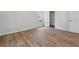 Bedroom featuring hardwood floors, neutral paint, and walk-in closet at 3530 Boulder Cir, Ellenwood, GA 30294