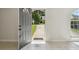 Bright entryway with tile flooring and an open front door welcoming visitors at 3530 Boulder Cir, Ellenwood, GA 30294