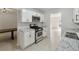 Modern kitchen featuring white cabinets, granite countertops, and stainless steel appliances at 3530 Boulder Cir, Ellenwood, GA 30294