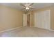 Comfortable bedroom with ceiling fan, closet and carpet at 4259 Arbor Club Dr, Marietta, GA 30066
