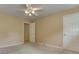 Neutral bedroom with ceiling fan, carpet, and closet space offers comfort and functionality at 4259 Arbor Club Dr, Marietta, GA 30066