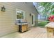Spacious outdoor deck with a grill perfect for entertaining, with access to a small backyard at 4259 Arbor Club Dr, Marietta, GA 30066
