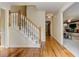 Foyer features hardwood floors, a staircase, and an entry to a living room at 4259 Arbor Club Dr, Marietta, GA 30066