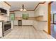 Bright kitchen features tile floors, stainless steel appliances, and wooden accents at 4259 Arbor Club Dr, Marietta, GA 30066