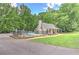 Community pool featuring a clubhouse, umbrellas, lounge chairs and surrounding fence at 4259 Arbor Club Dr, Marietta, GA 30066