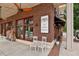 Charming boutique featuring a brick facade, large windows, and stylish signage at 105 Cumming St, Alpharetta, GA 30009