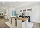 Elegant dining room with hardwood floors, stylish light fixture, and sophisticated decor at 105 Cumming St, Alpharetta, GA 30009