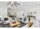 Open-concept living space with a seamless flow into the dining area and kitchen at 105 Cumming St, Alpharetta, GA 30009