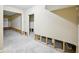 Unfinished basement with concrete floors and exposed wall studs at 1636 Caswell Pkwy, Marietta, GA 30060
