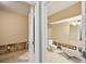 View of an unfinished bathroom and room, showing exposed wall frames at 1636 Caswell Pkwy, Marietta, GA 30060