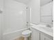 Bathroom featuring a bathtub with shower, toilet, and vanity at 1636 Caswell Pkwy, Marietta, GA 30060