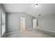 Spacious bedroom with carpeted floors, light colored walls, and vaulted ceilings at 1636 Caswell Pkwy, Marietta, GA 30060