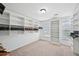 Large, walk-in closet with custom shelving and two windows at 1636 Caswell Pkwy, Marietta, GA 30060