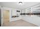 Large walk-in closet featuring custom shelving and bright lighting at 1636 Caswell Pkwy, Marietta, GA 30060