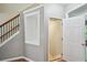 View of the staircase with iron railings and a doorway leading to another room in the home at 1636 Caswell Pkwy, Marietta, GA 30060