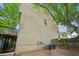 A view of the exterior of the home showcasing the brick facade and outdoor space at 1636 Caswell Pkwy, Marietta, GA 30060