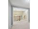 Open second story landing with a view of the downstairs through a large entryway at 1636 Caswell Pkwy, Marietta, GA 30060