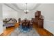 Elegant dining room featuring hardwood floors and chandelier lighting at 2988 Rivergreen Se Ln, Atlanta, GA 30339