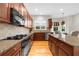 A spacious kitchen featuring granite countertops, stainless steel appliances, and ample cabinet space at 2988 Rivergreen Se Ln, Atlanta, GA 30339