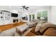 Inviting living room with fireplace, built-in shelves and hardwood floors at 2988 Rivergreen Se Ln, Atlanta, GA 30339