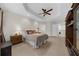 Spacious main bedroom features a tray ceiling, plush carpeting, and ample natural light at 2988 Rivergreen Se Ln, Atlanta, GA 30339