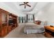 Spacious main bedroom features a tray ceiling, plush carpeting, and ample natural light at 2988 Rivergreen Se Ln, Atlanta, GA 30339