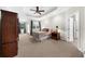 Spacious main bedroom features a tray ceiling, plush carpeting, and ample natural light at 2988 Rivergreen Se Ln, Atlanta, GA 30339