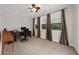 Bright office space features three large windows, and neutral carpeting at 2988 Rivergreen Se Ln, Atlanta, GA 30339