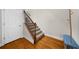 Elegant staircase with wooden rails and carpeted steps, offering a seamless transition between floors at 2988 Rivergreen Se Ln, Atlanta, GA 30339
