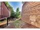 Graded backyard with a seating area against a landscape-block retaining wall at 3351 Cumberland Club Dr # 17, Atlanta, GA 30339