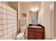 Bathroom with shower, tile floors, and wood vanity at 3351 Cumberland Club Dr # 17, Atlanta, GA 30339