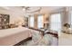 Bright bedroom featuring a ceiling fan, hardwood floors and plentiful natural light at 3351 Cumberland Club Dr # 17, Atlanta, GA 30339
