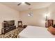 Bright bedroom with hardwood floors and a ceiling fan at 3351 Cumberland Club Dr # 17, Atlanta, GA 30339