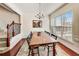 Elegant dining room featuring hardwood floors, chandelier, and ample natural light at 3351 Cumberland Club Dr # 17, Atlanta, GA 30339