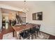 Classic dining room with hardwood floors, chandelier, and natural light at 3351 Cumberland Club Dr # 17, Atlanta, GA 30339