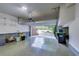Clean garage with epoxy floor and an automatic door at 3351 Cumberland Club Dr # 17, Atlanta, GA 30339