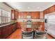 Modern kitchen featuring stainless steel appliances, granite countertops, and a breakfast bar at 3351 Cumberland Club Dr # 17, Atlanta, GA 30339