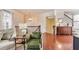 View of a spacious open landing with gleaming hardwood floors and staircase at 3351 Cumberland Club Dr # 17, Atlanta, GA 30339