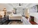 Comfortable main bedroom boasts tray ceiling, large windows, and an en-suite bath at 3351 Cumberland Club Dr # 17, Atlanta, GA 30339