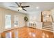 Finished basement featuring glass doors and staircase to kitchen at 4140 Candler Lake West Ne, Atlanta, GA 30319