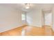 Bedroom with hardwood flooring and neutral walls providing a serene and comfortable space at 4140 Candler Lake West Ne, Atlanta, GA 30319