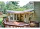 View of wooden deck and enclosed patio area at 4140 Candler Lake West Ne, Atlanta, GA 30319