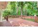 Spacious wood deck nestled among tall trees at 4140 Candler Lake West Ne, Atlanta, GA 30319