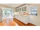 Bright kitchen features granite counters, ample storage, and seamless access to breakfast area at 4140 Candler Lake West Ne, Atlanta, GA 30319