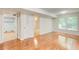 Bright room with gleaming hardwood floors, closet, and tiled room off to the side at 4140 Candler Lake West Ne, Atlanta, GA 30319